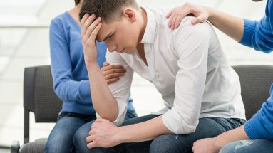 man receiving addiction support programs
