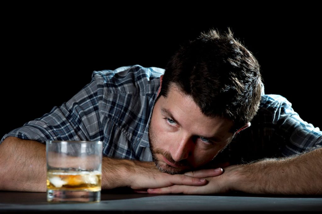 man thinking about try to control drinking