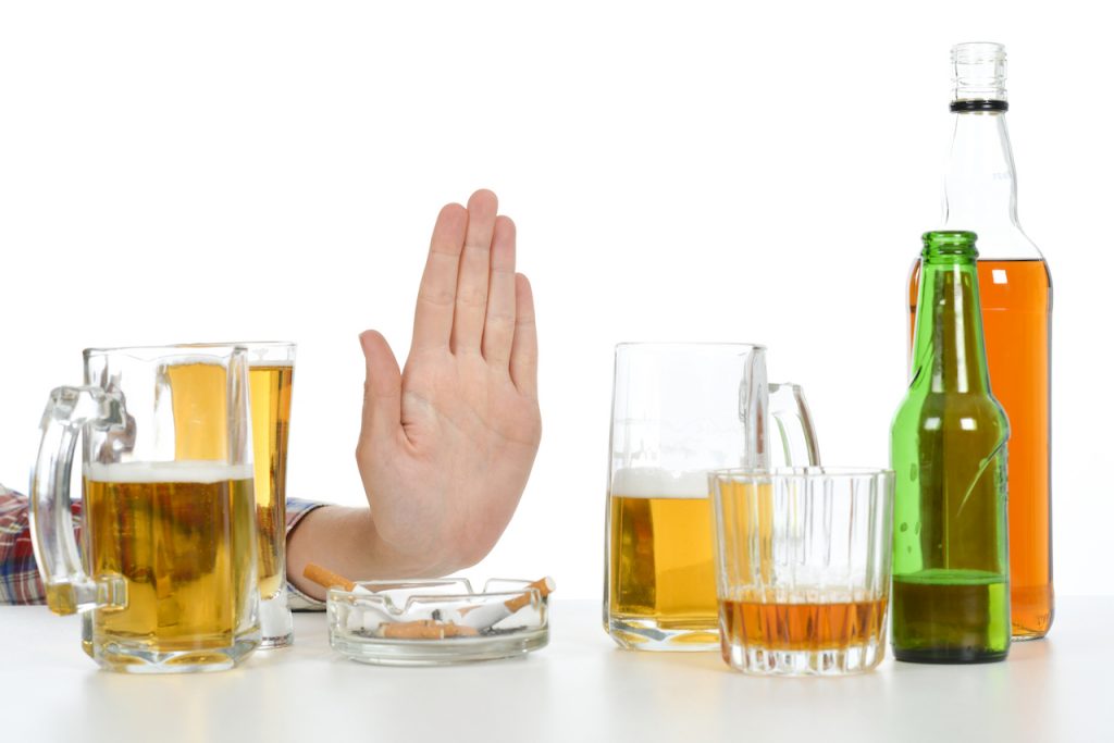 hand saying no to drinks in dry january